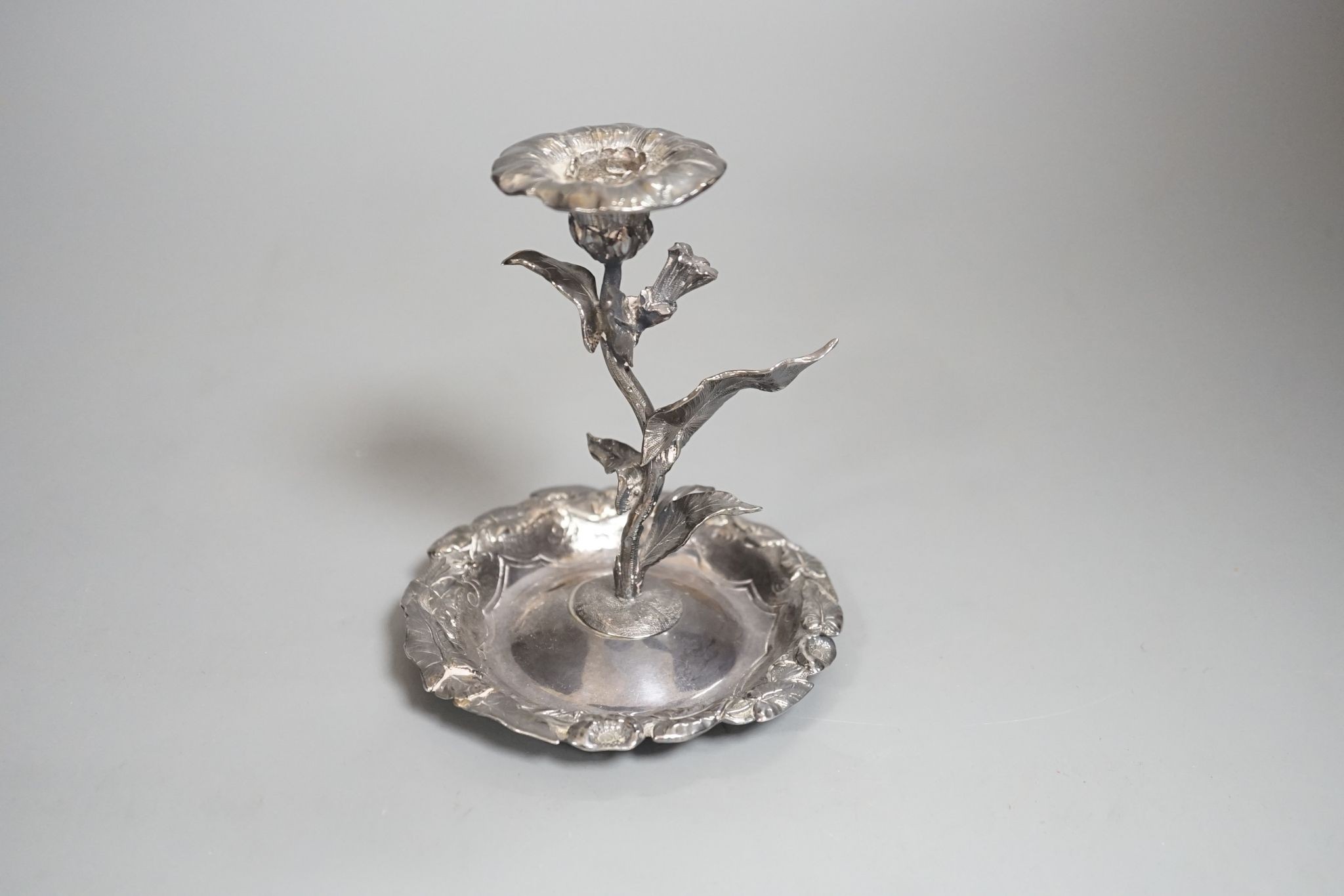 A George IV silver candlestick, naturalistically modelled as stemmed flower, London, 1828, by Riley and Sumner, 11cm, 145 grams.